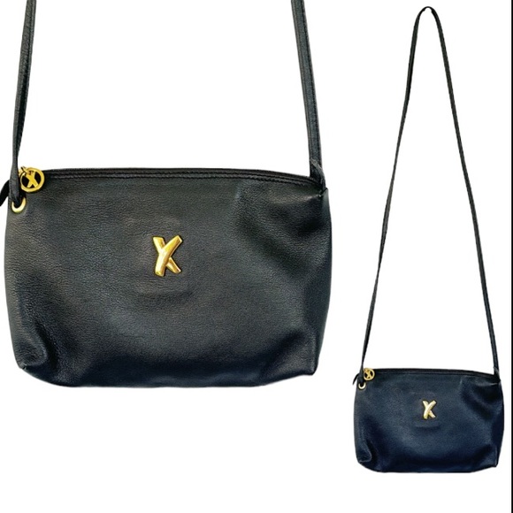 By Paloma Picasso black genuine leather zip closure gold...